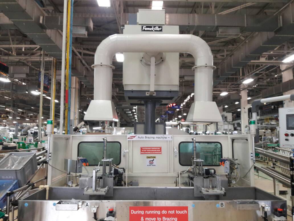 Control of Brazing Fumes: Successful Implementation of FumeKiller® model FK3600EM for extraction of fumes from automatic brazing machine.